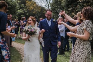 This is a picture of Claire's wedding featuring a beautiful wedding dress called Blenheim by Nicola Anne from Fairytale Bride