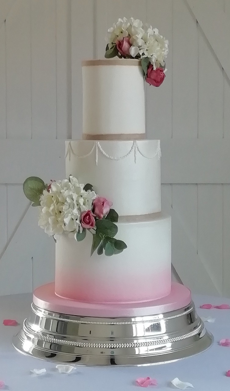 A wedding cake by essex county cakes at Fairytale Bride